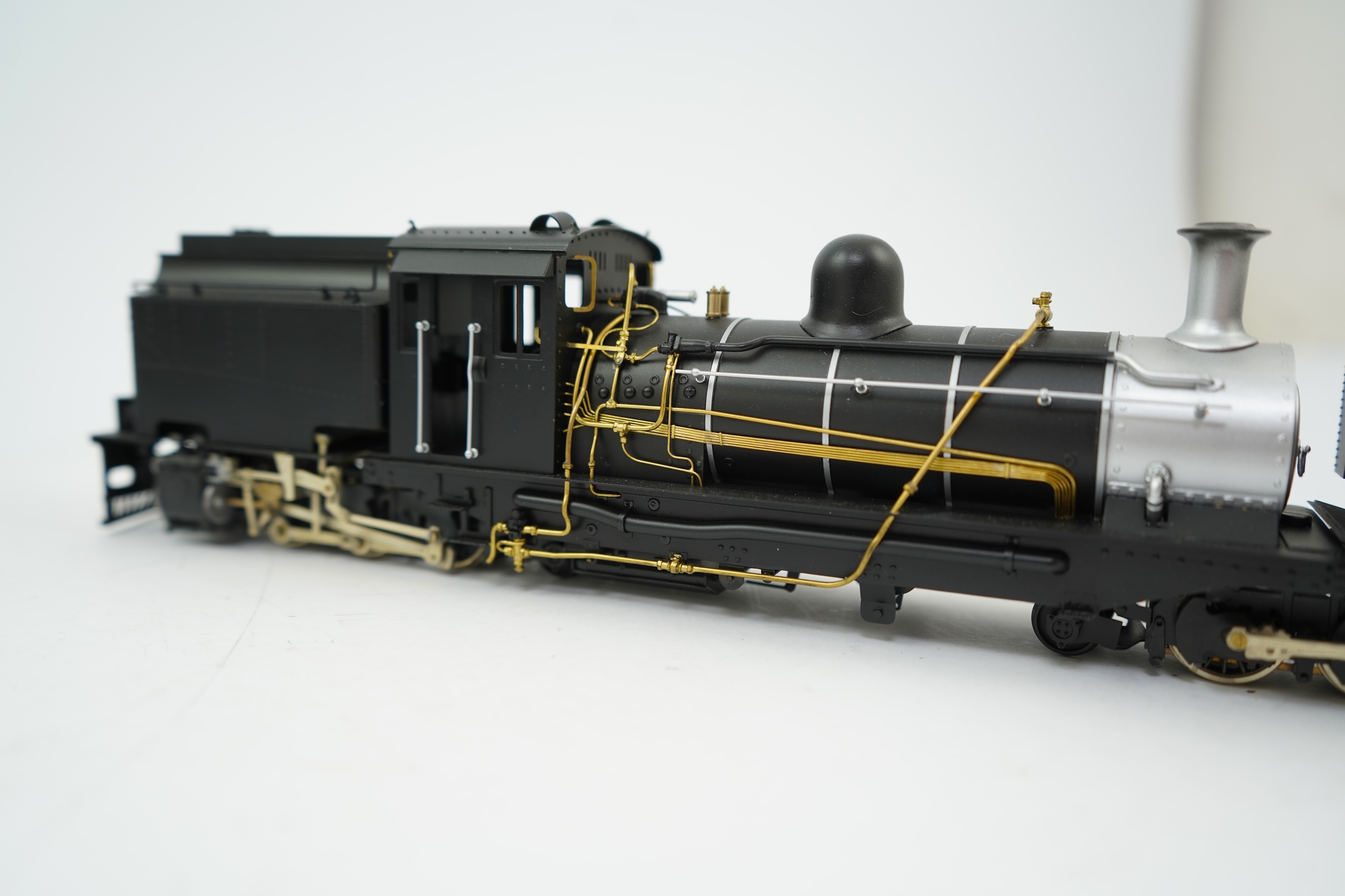 An On30 gauge (1:48 scale) 2-6-2+2-6-2 Beyer-Garratt locomotive, a finely detailed model, of painted brass, etc. construction, running on 00 gauge track and powered for two rail operation